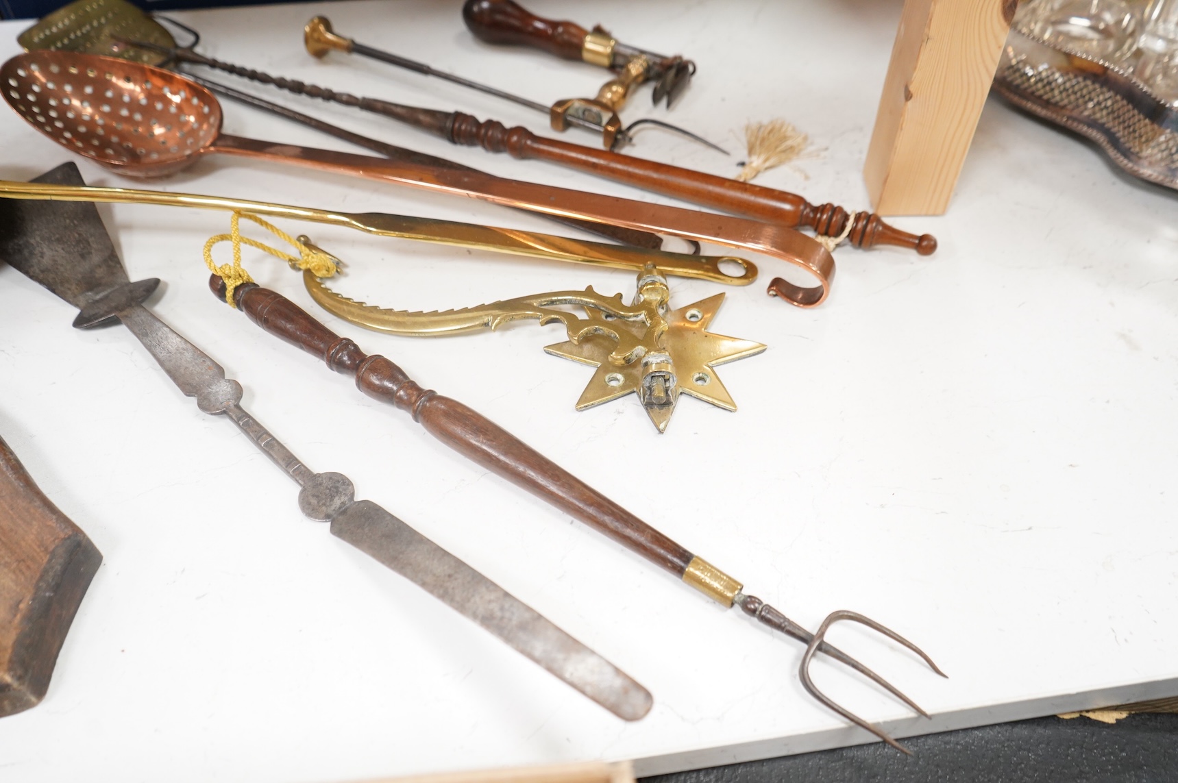 A 19th century toasting fork - longest 59cms, strainer spoons, etc